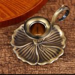 Bougeoir à main en fer forgé - design floral