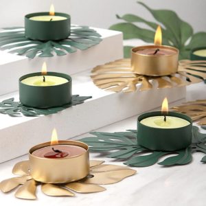 Bougeoir doré avec motif Monstera