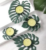 Design chic pour bougeoir doré Monstera