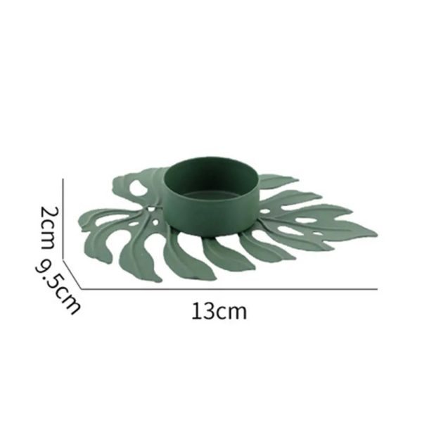 Bougeoir doré avec feuilles Monstera