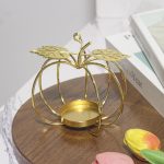 Accessoire décoratif doré en forme de courge pour bougie