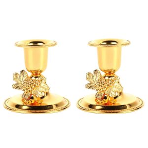 Bougeoirs dorés pour une ambiance chaleureuse