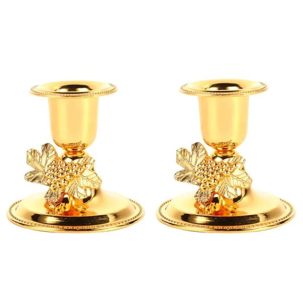 Bougeoirs dorés pour une ambiance chaleureuse