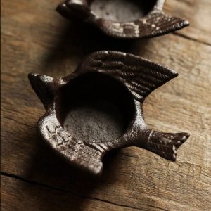 Élégant bougeoir en métal, motif oiseau en fonte
