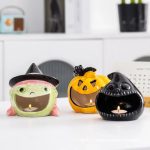 Bougeoir en céramique avec motif de monstre