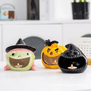 Bougeoir en céramique avec motif de monstre