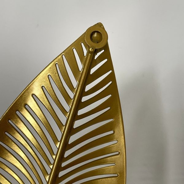 Bougeoirs muraux dorés pour ambiance chaleureuse