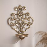 Bougeoir mural doré pour une ambiance chic