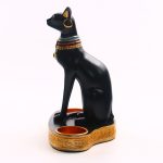 Élégant bougeoir noir évoquant la déesse Bastet