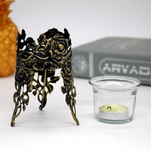 Bougeoir noir au design romantique avec roses