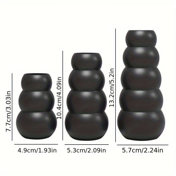 Set de 3 bougeoirs noirs au style vintage