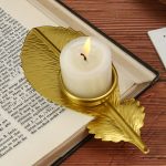 Bougeoir Plume Dorée en métal doré élégant