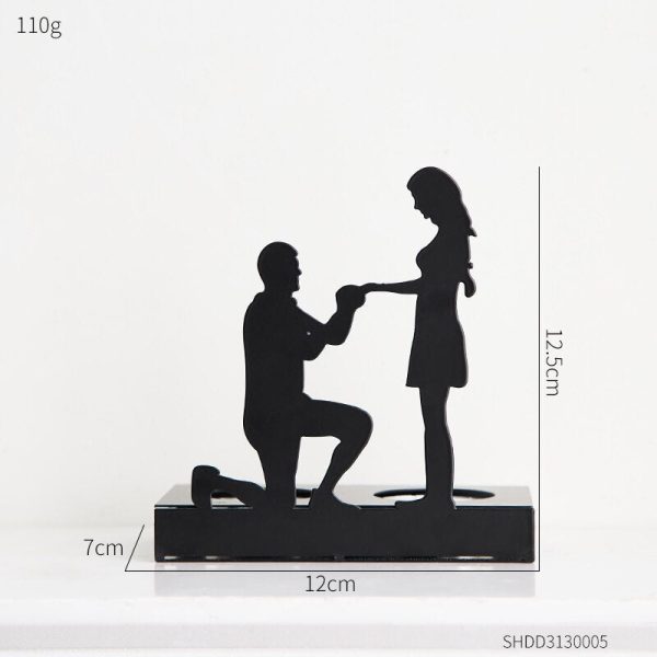 Bougeoir décoratif en fer avec design amoureux