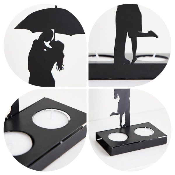 Silhouette d'amoureux sur bougeoir en fonte