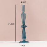 Bougeoir design en verre bleu canard