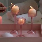 Bougeoir en verre avec pieds colorés