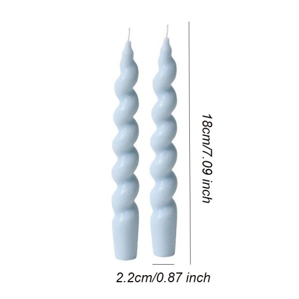 Bougies pastel en torsade, éclat et charme