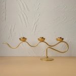 Chandelier Onde avec trois bougies pour une ambiance chaleureuse