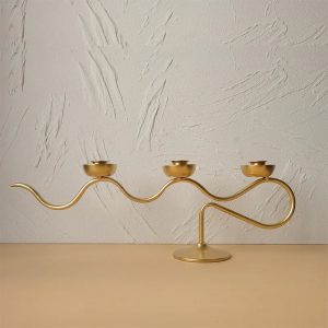 Chandelier Onde avec trois bougies pour une ambiance chaleureuse