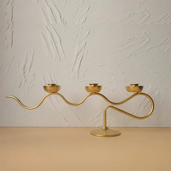 Chandelier Onde avec trois bougies pour une ambiance chaleureuse