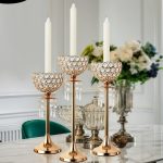 Bougeoir doré avec détails en pampilles pour une touche glamour