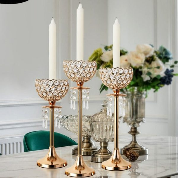 Bougeoir doré avec détails en pampilles pour une touche glamour