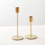 Élégant éclairage en fer forgé doré