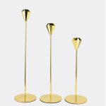 Bougeoir contemporain noir avec finition rose dorée