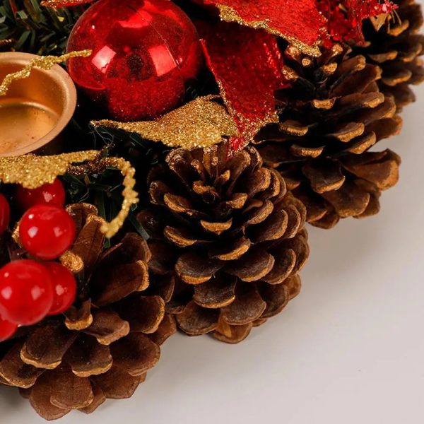 Couronne de Noël avec bougeoirs pour une atmosphère accueillante