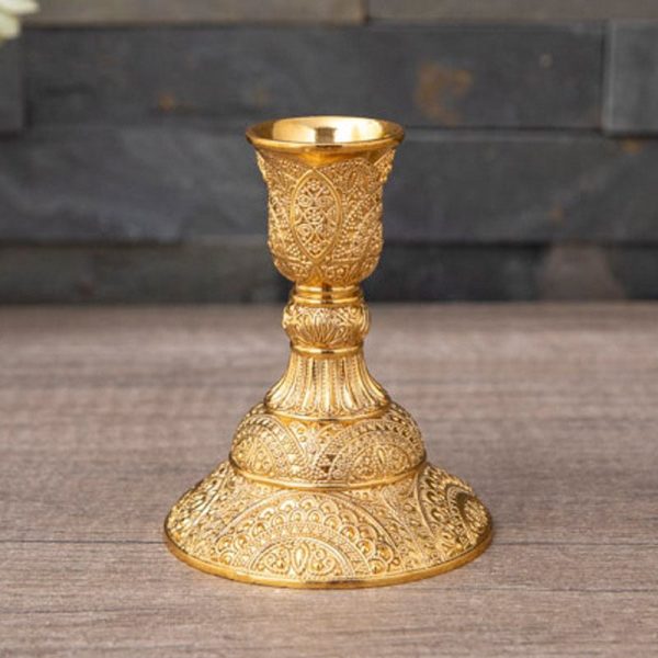 Petit bougeoir doré, accessoire chic pour table