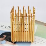 Photophore doré avec motif couronne raffinée