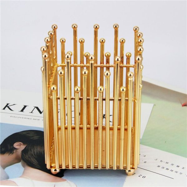 Photophore doré avec motif couronne raffinée