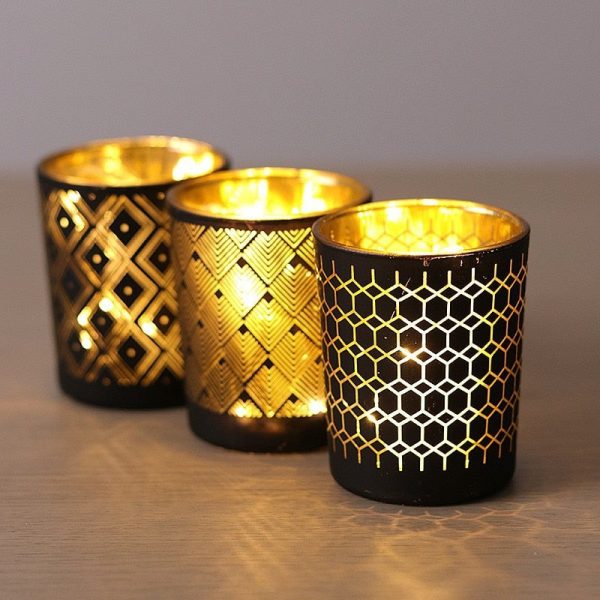 Photophore noir avec finition dorée pour une ambiance chic