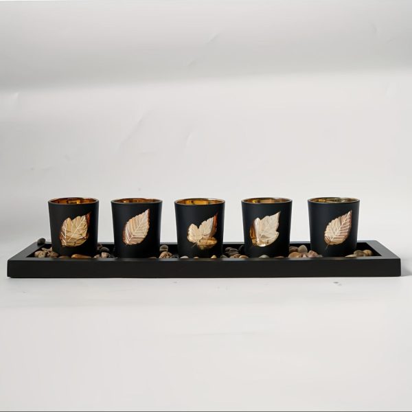 Élégant photophore noir, décoré de feuilles dorées