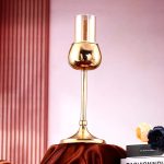 Photophore élégant en verre et dorure