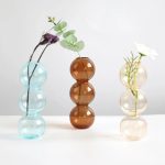 Vase boule en verre pour arrangements floraux
